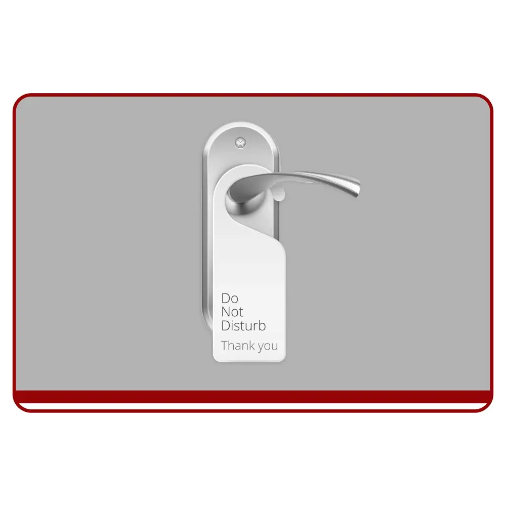 Do Not Disturb sign on a door handle with a red border