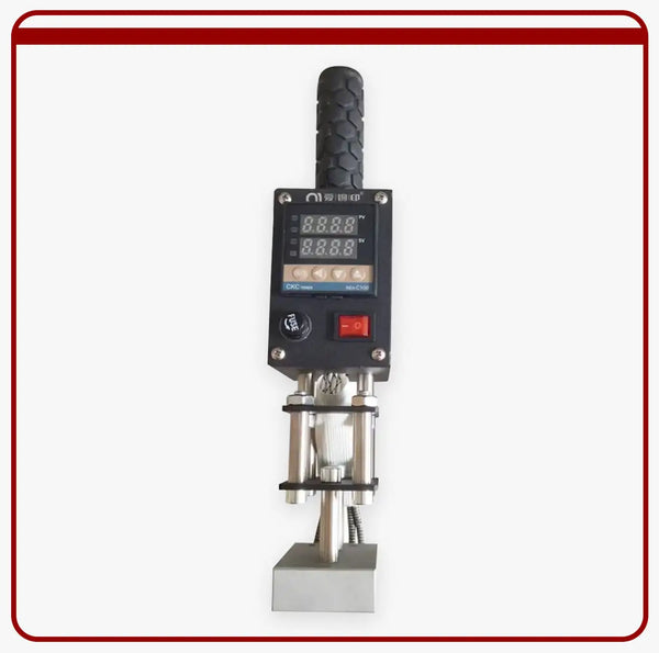 Black digital heat press with a textured grip handle and metallic clamping mechanism.