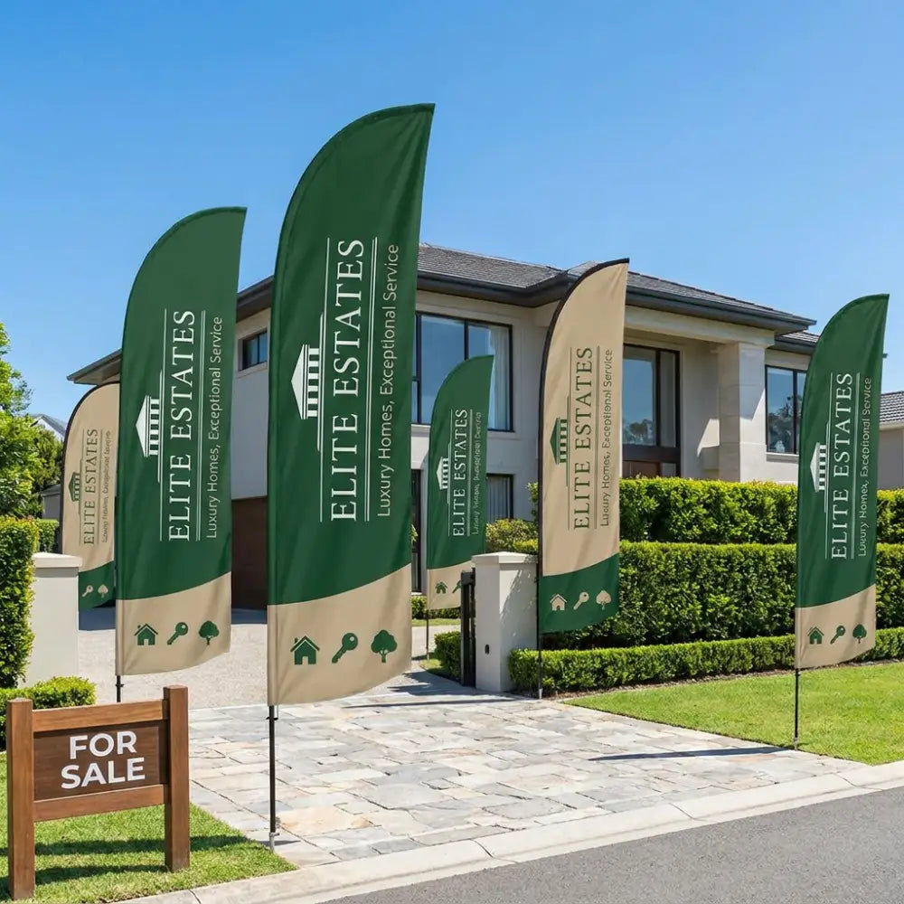 Elite Estates flags in front of a house with 'For Sale' sign