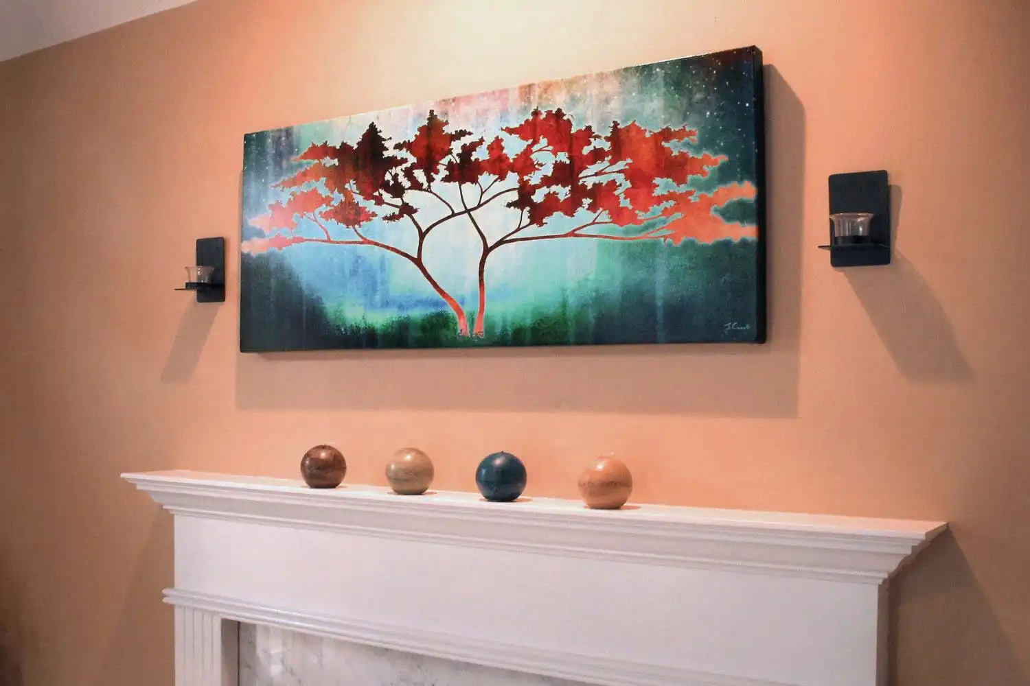 Canvas artwork featuring a red-leafed tree silhouetted against a turquoise background.