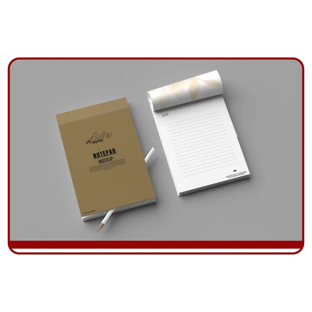 Notebook and open notepad on a gray surface with a red border