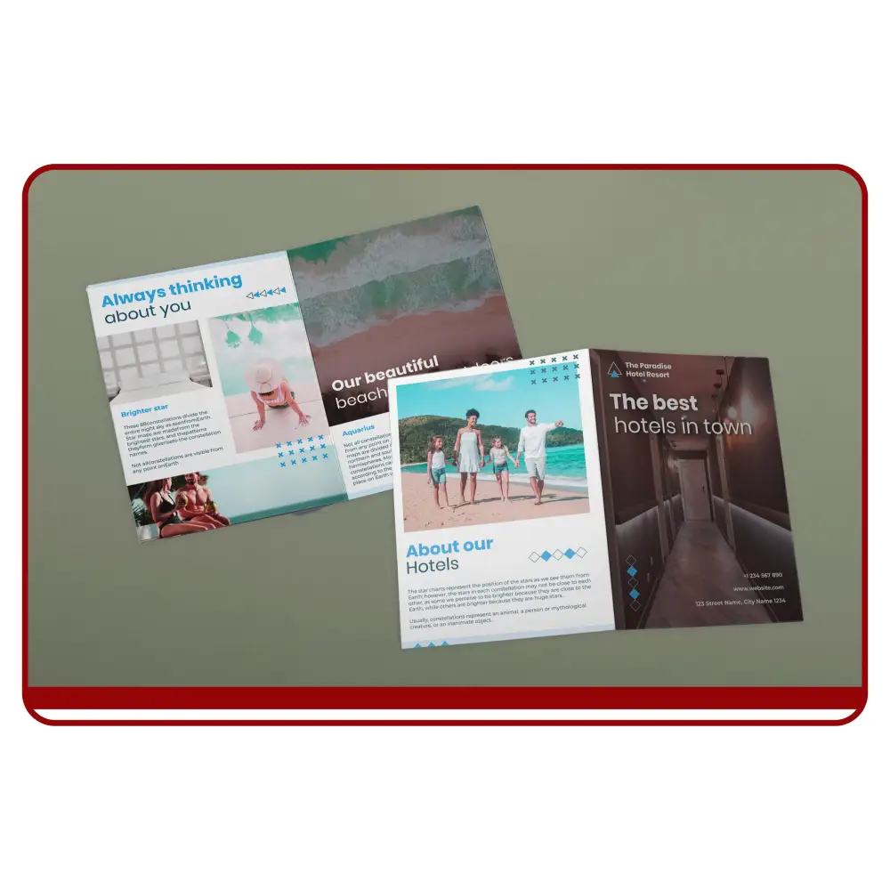 Three brochures on a gray surface with a red border