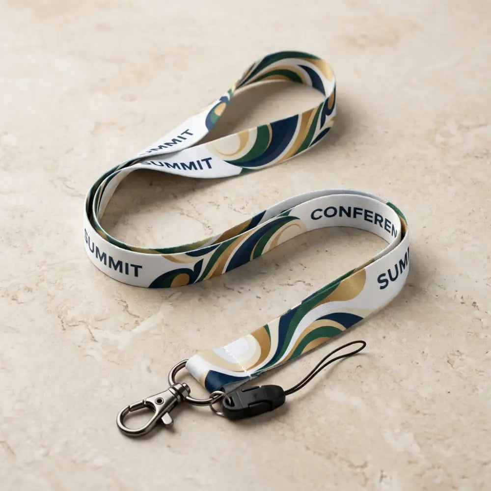 Lanyard with 'Summit' and 'Conference' text on a beige surface