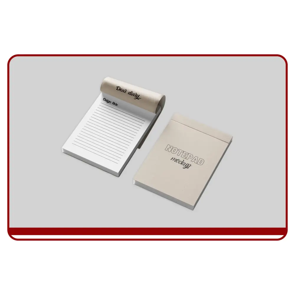 Notebook and notepad with text on a gray background
