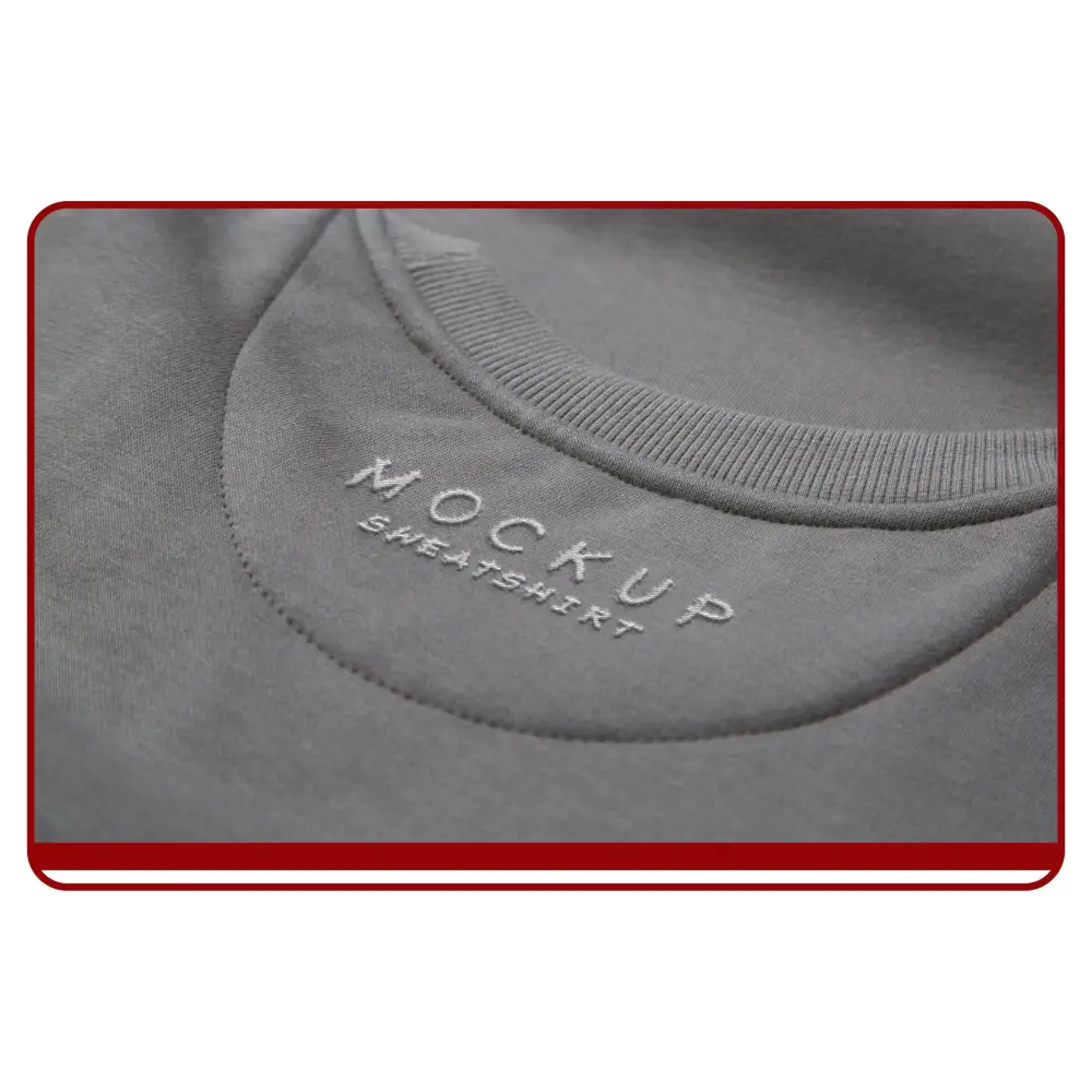 Gray sweatshirt mockup with 'MOCKUP SWEATSHIRT' text on a plain background