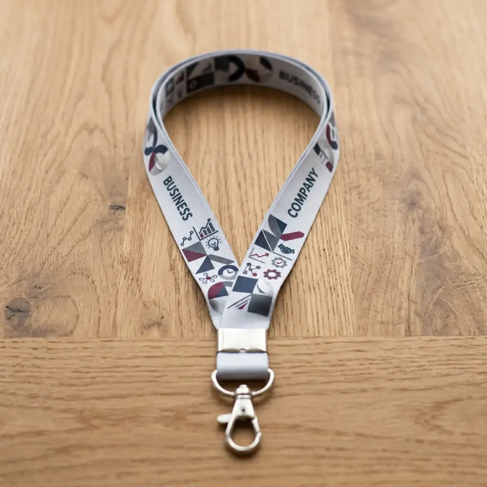 Lanyard with decorative design on a wooden surface
