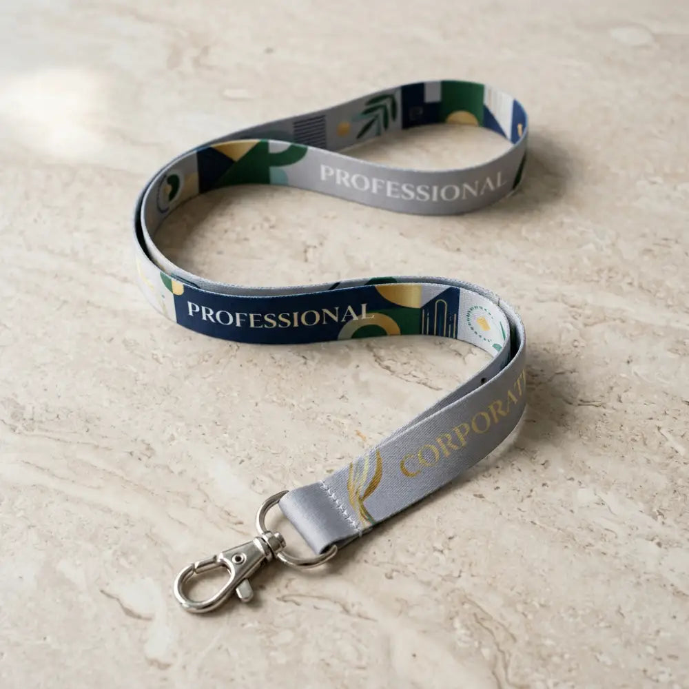 Two lanyards with 'PROFESSIONAL' and 'CORPORATE' text on a beige surface