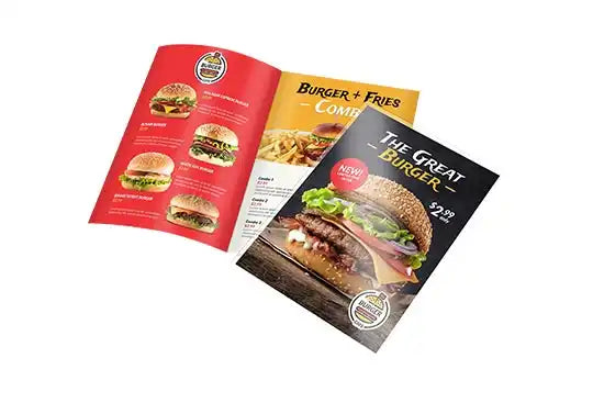 Restaurant menu booklets featuring burger and fries photography.