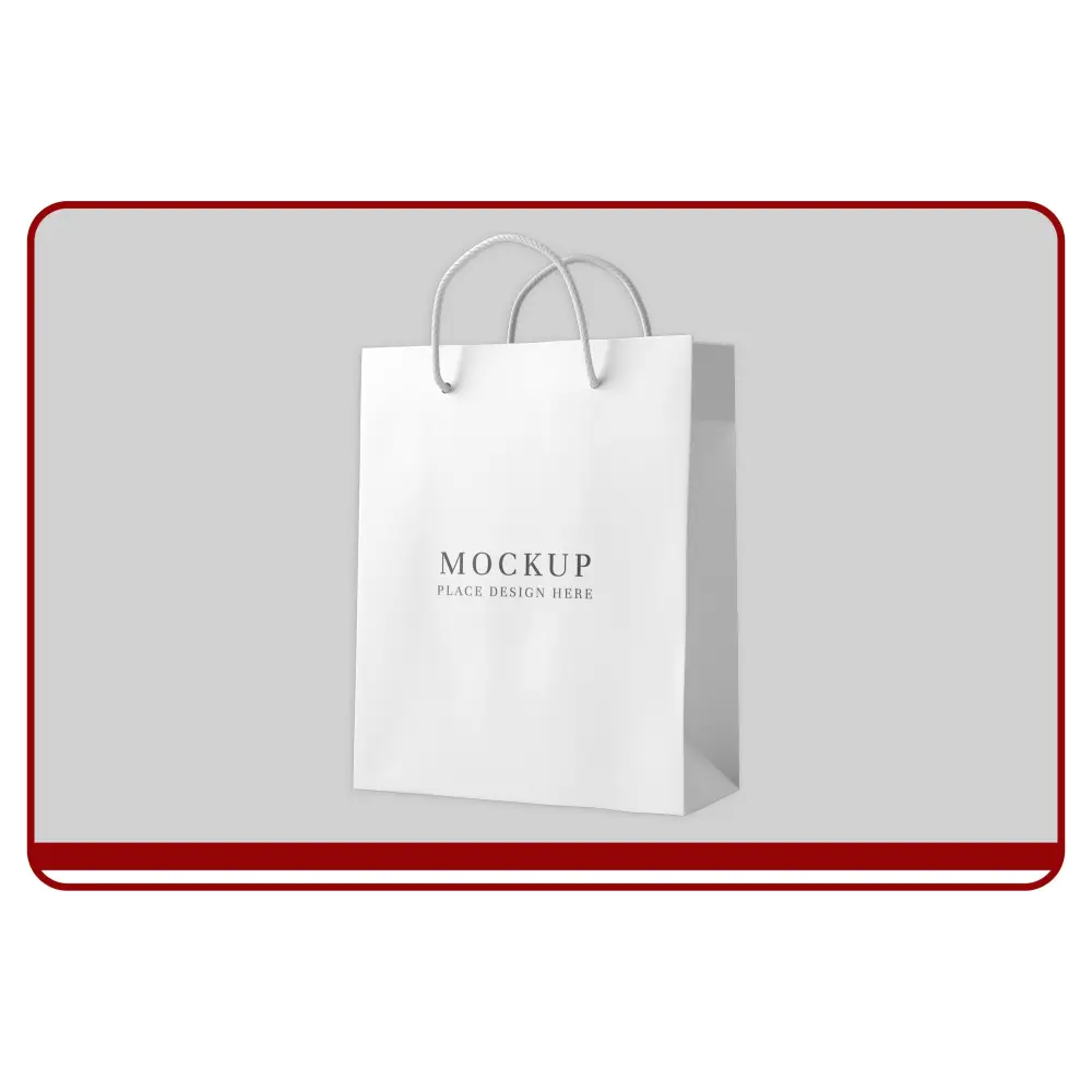 White paper shopping bag with 'MOCKUP PLACE DESIGN HERE' text on a gray background