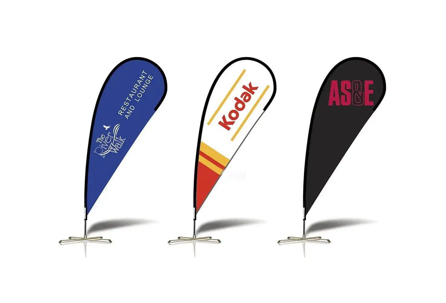 Three teardrop-shaped promotional flags in blue, white/orange, and black colors mounted on stands.