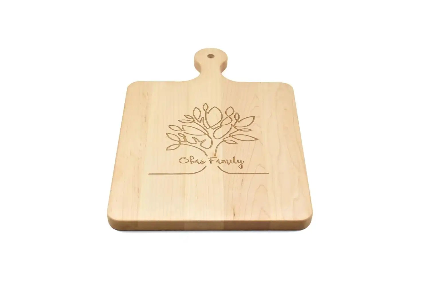 Wooden cutting board with an engraved floral design and handle.