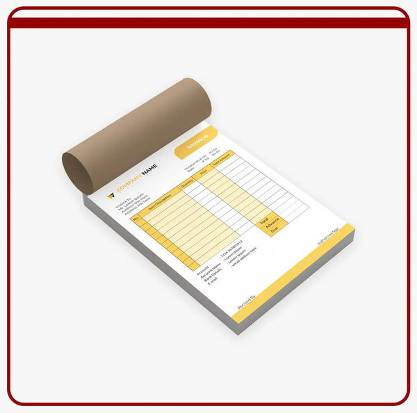 Yellow and white invoice pad with a brown roll of paper.